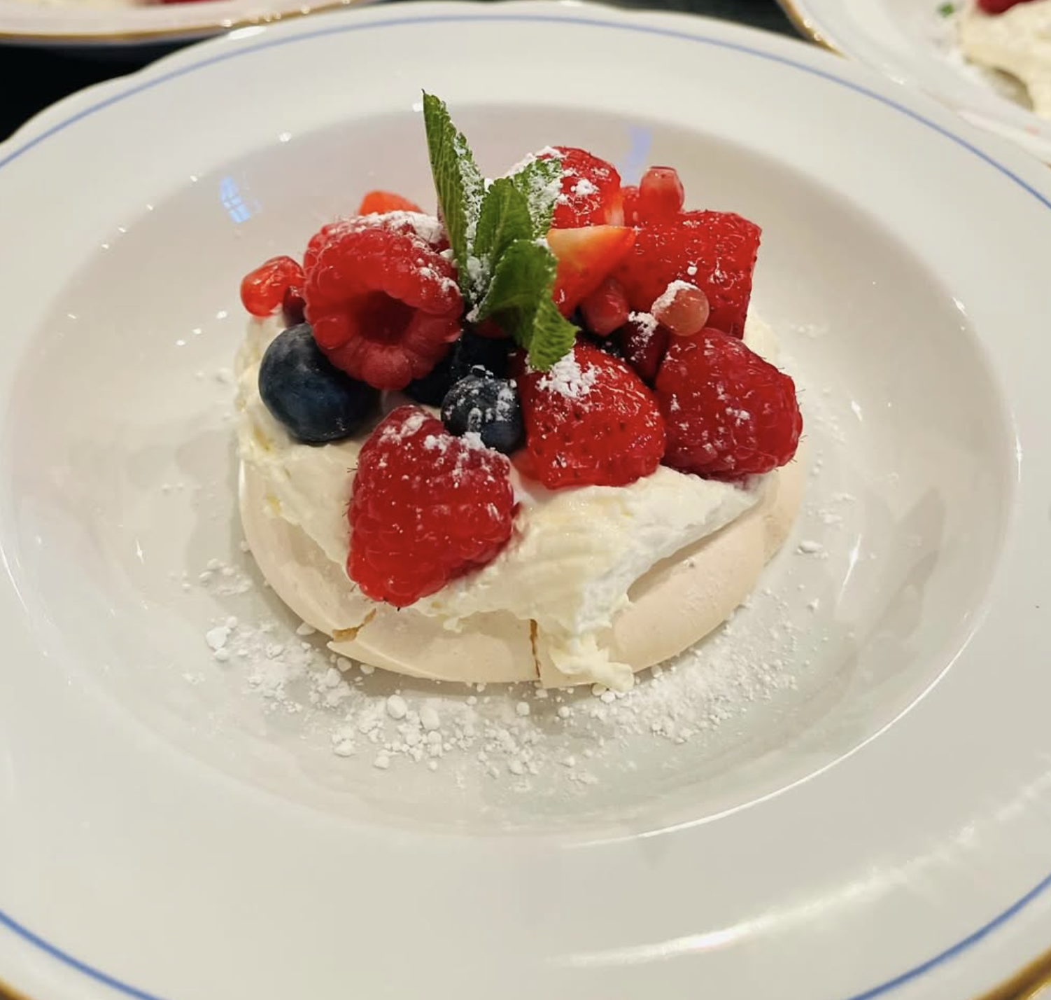 Individual pavlova with fresh summer berries